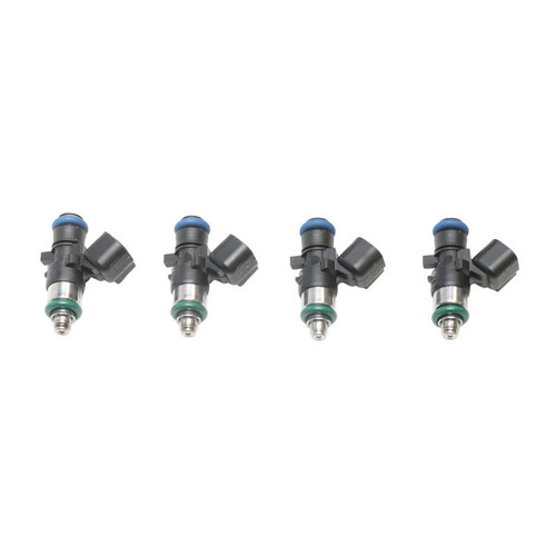 Set of four Deatschwerks 1000cc fuel injectors, side view showing electrical connectors and green O-rings.