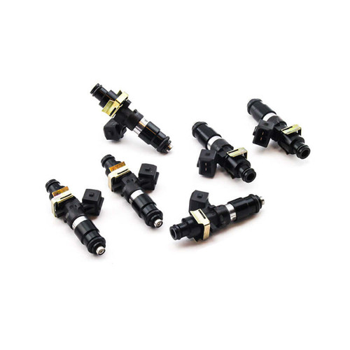 Set of six Deatschwerks Bosch EV14 1250cc fuel injectors for Lexus IS300 2JZ-GE, top angled view showing electrical connectors and O-ring tips.