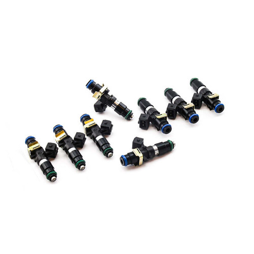 Set of eight Deatschwerks Bosch EV14 1250cc fuel injectors, black bodies with blue and green O-rings, arranged in two rows on white background.