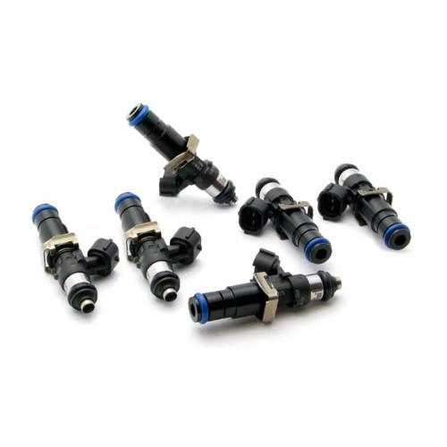 Set of six DeatschWerks 2400cc fuel injectors for Land Cruiser 1FZ-FE, showing connectors and O-ring tips.