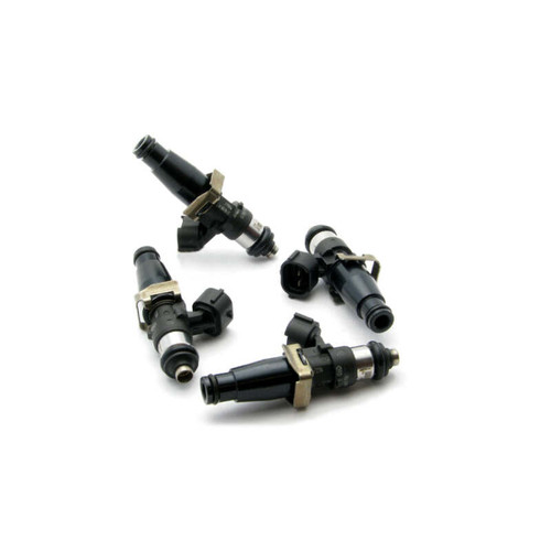Set of four DeatschWerks EV14 fuel injectors arranged in circle, black bodies with electrical connectors