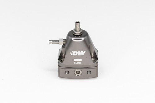 DeatschWerks DWR1000iL titanium fuel pressure regulator, front angle view showing DW logo, flow arrow and fittings