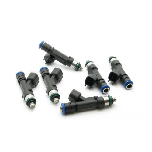 Set of six DeatschWerks 35lb top feed fuel injectors for 99-10 V6 Mustang, angled view showing electrical connectors and O-rings.