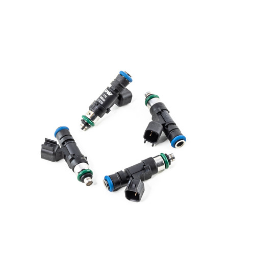 Set of four DeatschWerks 650cc fuel injectors for Honda K20/K24, black bodies, blue and green O-rings, electrical connectors visible.