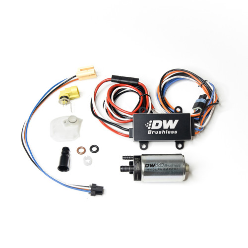 DeatschWerks DW440 brushless fuel pump kit with controller, wiring harness, connectors and install hardware laid out flat