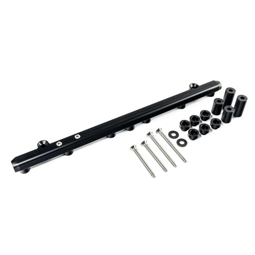 DeatschWerks Toyota 2JZ-GTE fuel rail kit shown at an angle with mounting spacers, bolts and washers