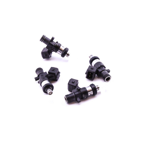 Set of four DeatschWerks EV14 1500cc fuel injectors, angled view showing electrical connectors and fuel rail seals.