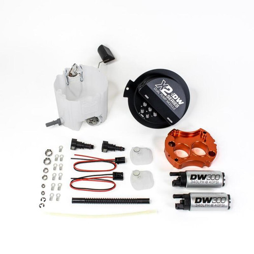 DeatschWerks X2 Series fuel pump module kit with two DW300 pumps, orange mounting bracket, fuel filter, wiring connectors and hardware laid out on
