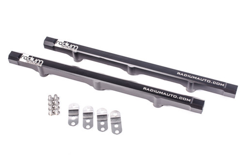 Radium Engineering LS7 fuel rails, black anodized, top angle view with mounting brackets and hardware