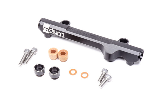 Radium Engineering Mazda 13B-RE secondary fuel rail kit with mounting bolts, spacers, and fittings laid out