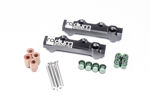 Radium Engineering DPI fuel rails for Subaru WRX, black billet pair with copper spacers, screws, and green injector seals