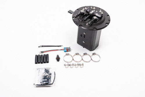 Radium fuel hanger kit, top down angle, showing black mounting plate, canister body, hose clamps, wiring and fittings laid out