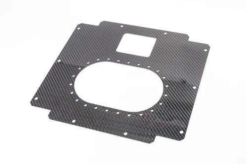 Radium Engineering carbon fiber fuel cell lid, 6 gallon, top view showing oval port and square cutout with bolt holes