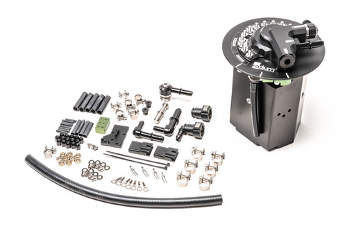 Radium Engineering fuel hanger for Cadillac CTS/CTS-V with fittings, clamps, and wiring hardware laid out beside the pump housing