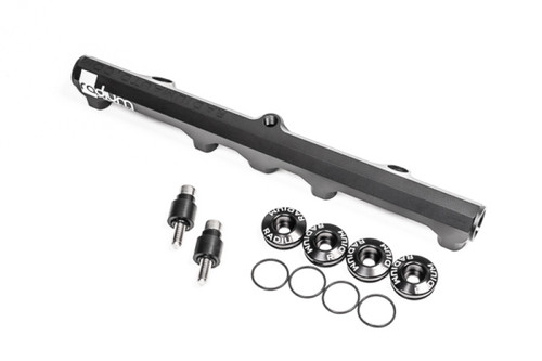 Radium Engineering KA24DE top feed fuel rail, angled view, with injector adapters, end caps and O-rings