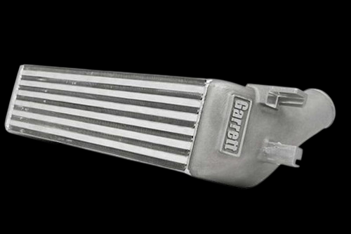 Garrett Mustang EcoBoost intercooler, angled view showing finned core and end tank with inlet/outlet ports.