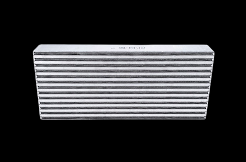 Garrett bar and plate intercooler core, front angled view showing dense fin rows and end tank.
