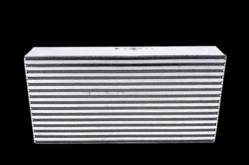 Garrett bar and plate intercooler core, front angle view showing corrugated fins and end tank, 950 HP