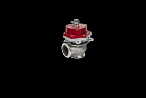 Garrett GVW-50 50mm wastegate kit in red, angled view showing top actuator and inlet flange
