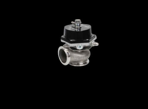 Garrett GVW-50 50mm wastegate, black top cap, polished steel body with V-band flange, angled view