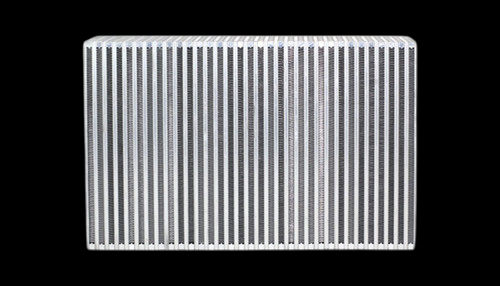 Vibrant Vertical Flow Intercooler, front view showing dense vertical cooling fins on a bare aluminum core