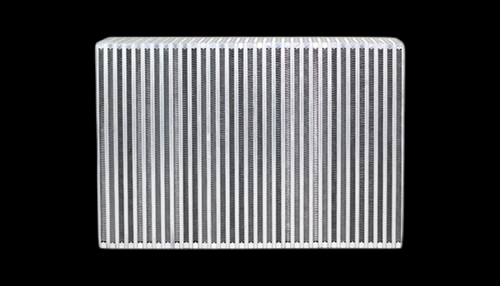 Vibrant vertical flow intercooler core, front view showing dense fin stack, bare aluminum finish