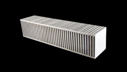 Vibrant vertical flow intercooler core, 27x6x6in, angled view showing bar and plate fin rows on black background