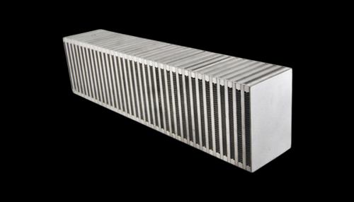 Vibrant vertical flow intercooler core, 24x6x4.5in, angled view showing bar and plate cooling fins