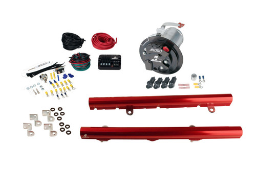 Aeromotive A1000 fuel system kit with red LS3 fuel rails, pump, wiring and fittings laid out