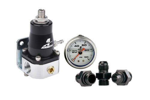Aeromotive fuel pressure regulator kit with black gauge, brass fitting and three black AN fittings.