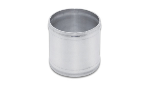 Vibrant aluminum joiner coupling, 3.25in O.D., angled top down view showing open cylindrical tube ends