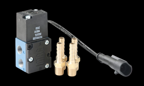 GFB G-Force 4-Port Solenoid valve with two brass hosetails and wired electrical connector, angled view