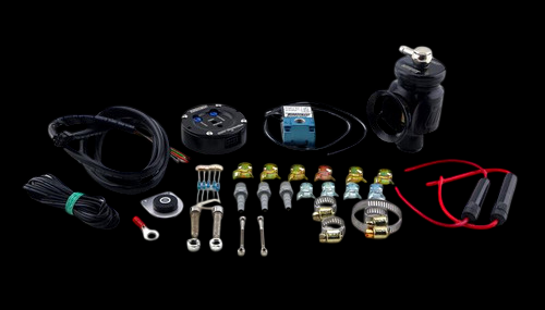 Turbosmart Kompact BOV Controller Kit with wiring, hose clamps, fittings, and blow off valve laid out