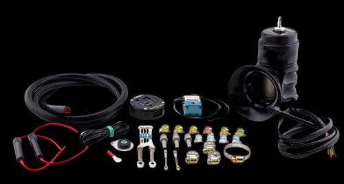 Turbosmart BOV Controller Kit with black Bubba valve, hoses, wiring, and clamps laid out flat