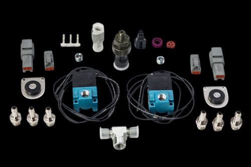 Haltech CO2 Boost Control Dual Solenoid and Pressure Sensor Kit with connectors, fittings and mounting brackets laid out