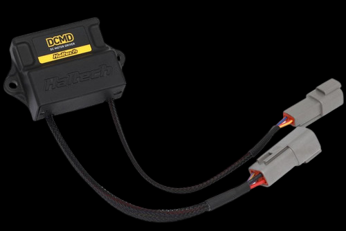 Haltech DCMD DC Motor Driver module, black case with yellow label, two braided cable connectors