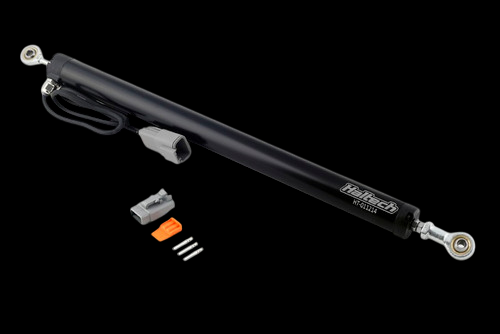 Haltech Linear Position Sensor with rod ends, connector, terminals and orange wedge lock, angled view