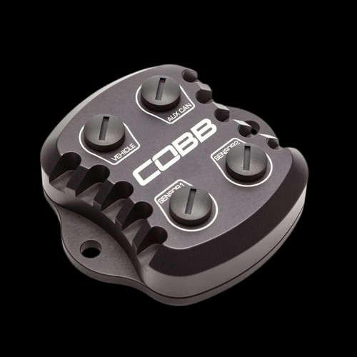 Cobb CAN Gateway module for 08-18 Nissan GT-R, top angled view showing 4 labeled connector ports