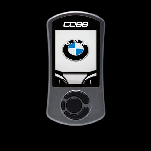 Cobb AccessPORT V3 handheld tuner, front view, showing BMW logo screen and control dial, for 135i/335i/535i