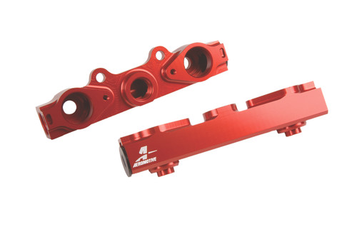 Aeromotive red anodized side feed fuel rails for 04-06 Subaru STI 2.5L, top and angled views