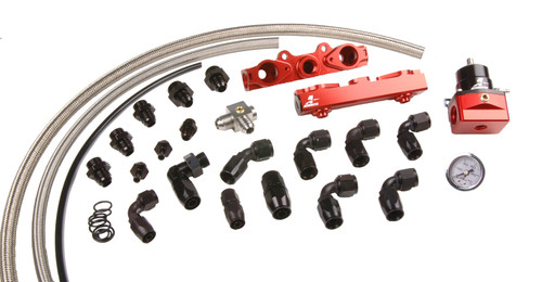 Aeromotive Subaru STI side feed fuel rail kit with red rails, black AN fittings, braided hose, gauge