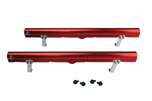 Aeromotive LS1 Edelbrock 29085 fuel rails, top down view showing pair of red anodized rails with mounting brackets and screws