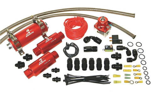 Aeromotive Tsunami Fuel System kit with red pumps, regulator, braided lines, fittings and hardware laid out