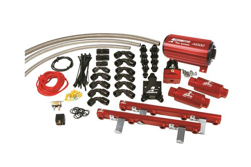 Aeromotive A1000 Competition Fuel System kit for 96-98.5 Ford DOHC 4.6L, showing pump, fuel rails, filters, fittings and hardware laid out flat.