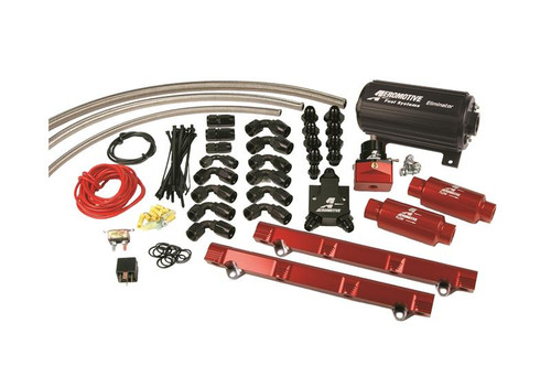 Aeromotive Eliminator fuel system kit for Ford DOHC 4.6L, showing pump, rails, fittings and hardware laid out