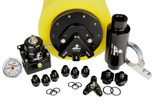 Aeromotive Phantom 200 return style fuel system with Y-block, yellow foam pump housing, fittings, gauge and inline filter shown from above