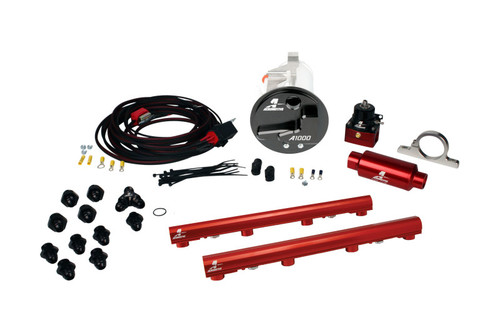 Aeromotive Stealth fuel system kit for 05-09 Mustang GT 4.6L, showing A1000 pump, red fuel rails, regulator, fittings and wiring harness laid out.