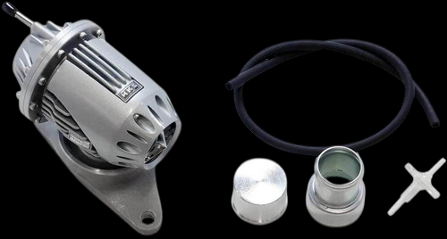 HKS Super SQV 4 blow off valve with return kit, hose, cap, fitting, and clip laid out on black background