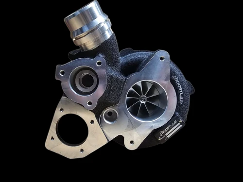 BL58XR turbocharger for Subaru WRX FA24, angled view showing compressor wheel, wastegate flange and polished aluminum inlet elbow