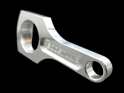 Boost Lab connecting rod bottle opener, polished aluminum, angled view showing engraved logo and big end bore.